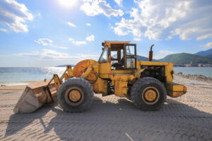 Heavy wheel loader bulldozer working at the construction site